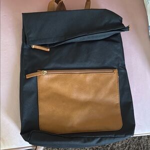 Stylish Black and Tan fold over Backpack